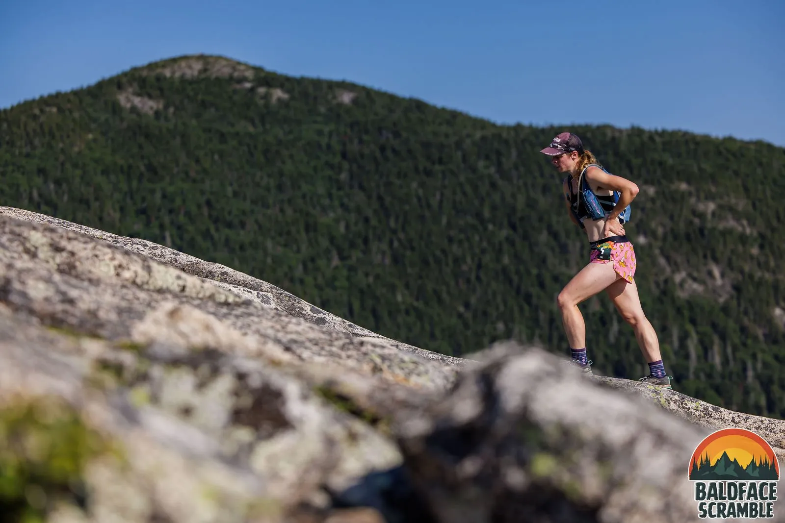 Runner climbing the open ridge