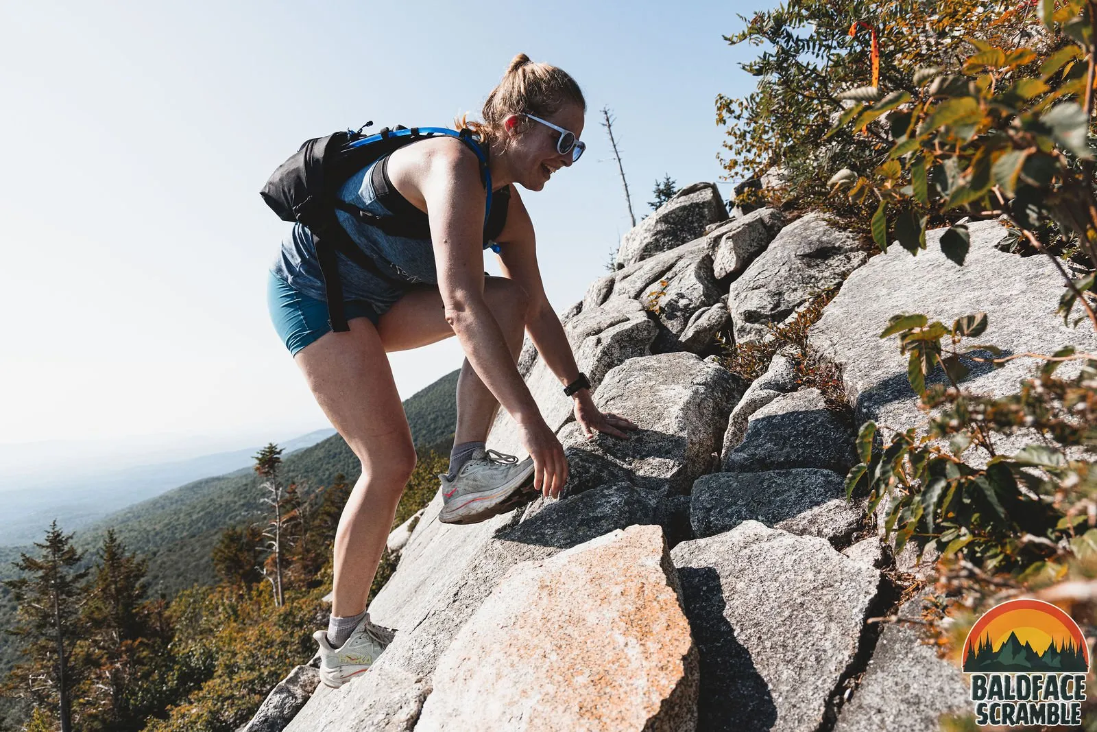 Runner pulling up the rock face