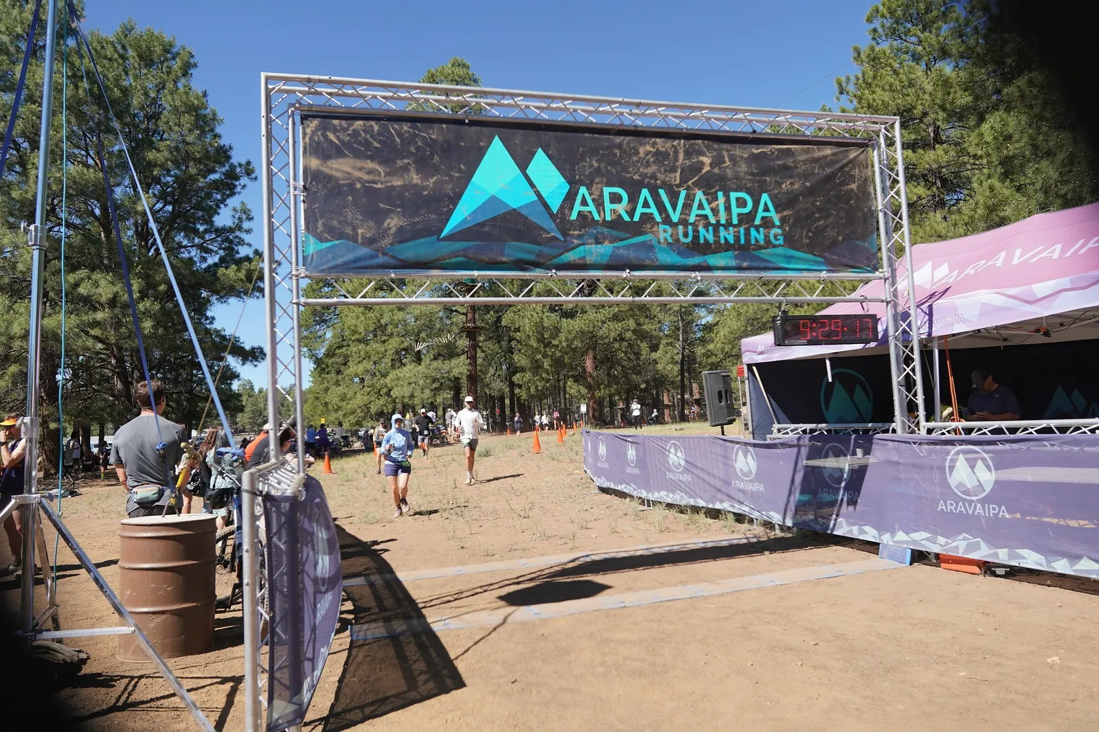 Runners coming in at the Big Pine Trail Runs finish line in the Flagstaff ponderosa pines