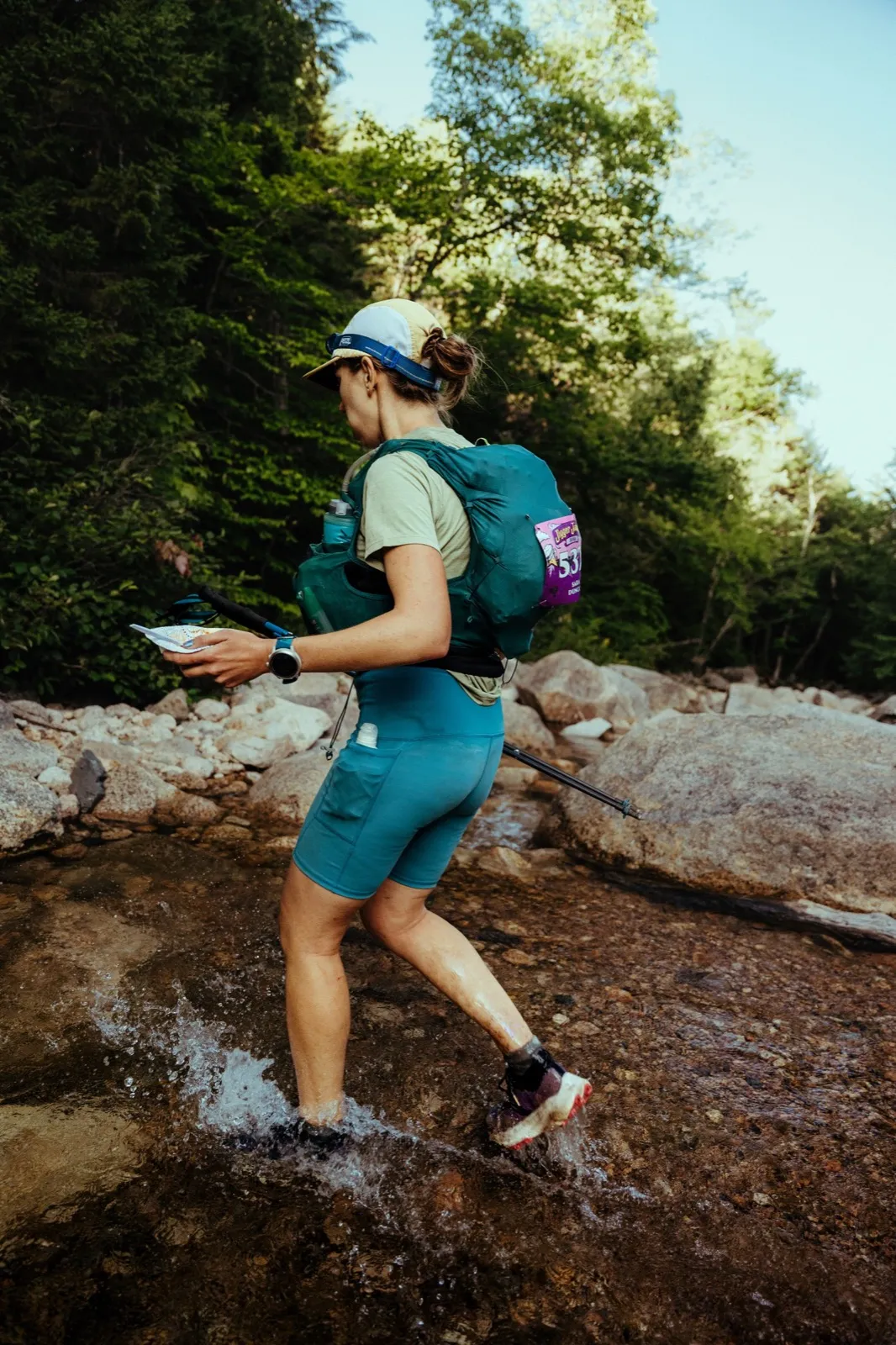 Splashing through a river crossing in the woods