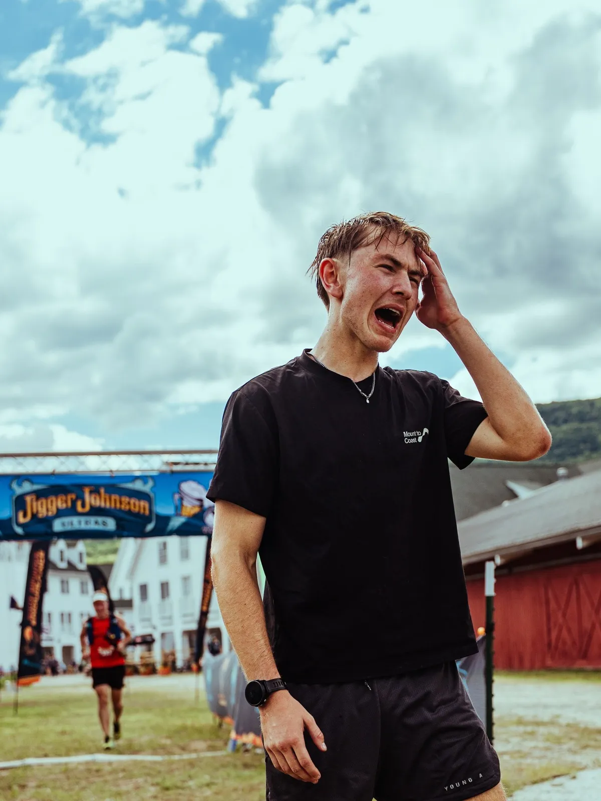 Overcome with emotion just past the finish arch