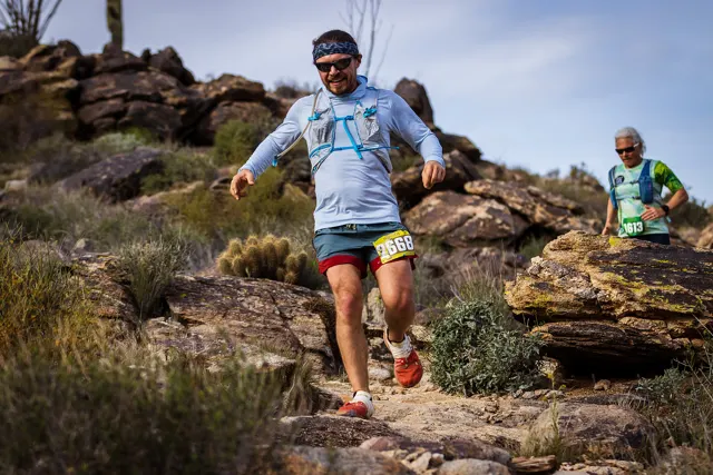 A runner in the boulders at Mesquite Canyon
